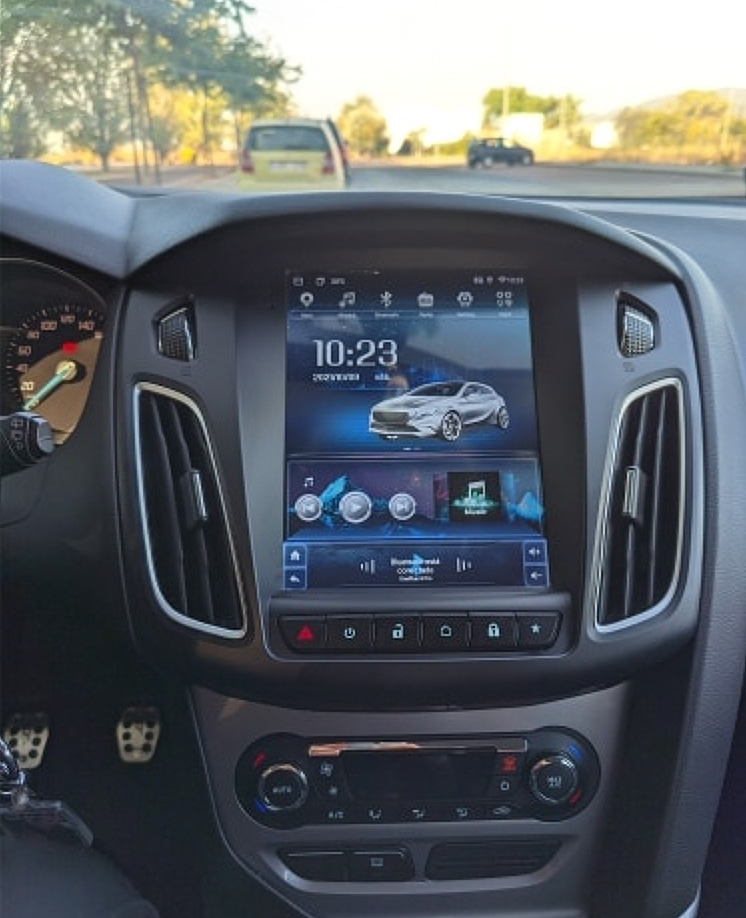Navigatie AUTONAV Android GPS Dedicata Ford Focus 3 2011-2018 Stil Tesla, 16GB Stocare, 1GB DDR3 RAM, Display Vertical Stil Tesla 10", WiFi, 2 x USB, Bluetooth, Quad-Core 4 x 1.3GHz, 4 x 50W Audio